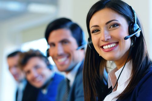 receptionist smiling with headset on