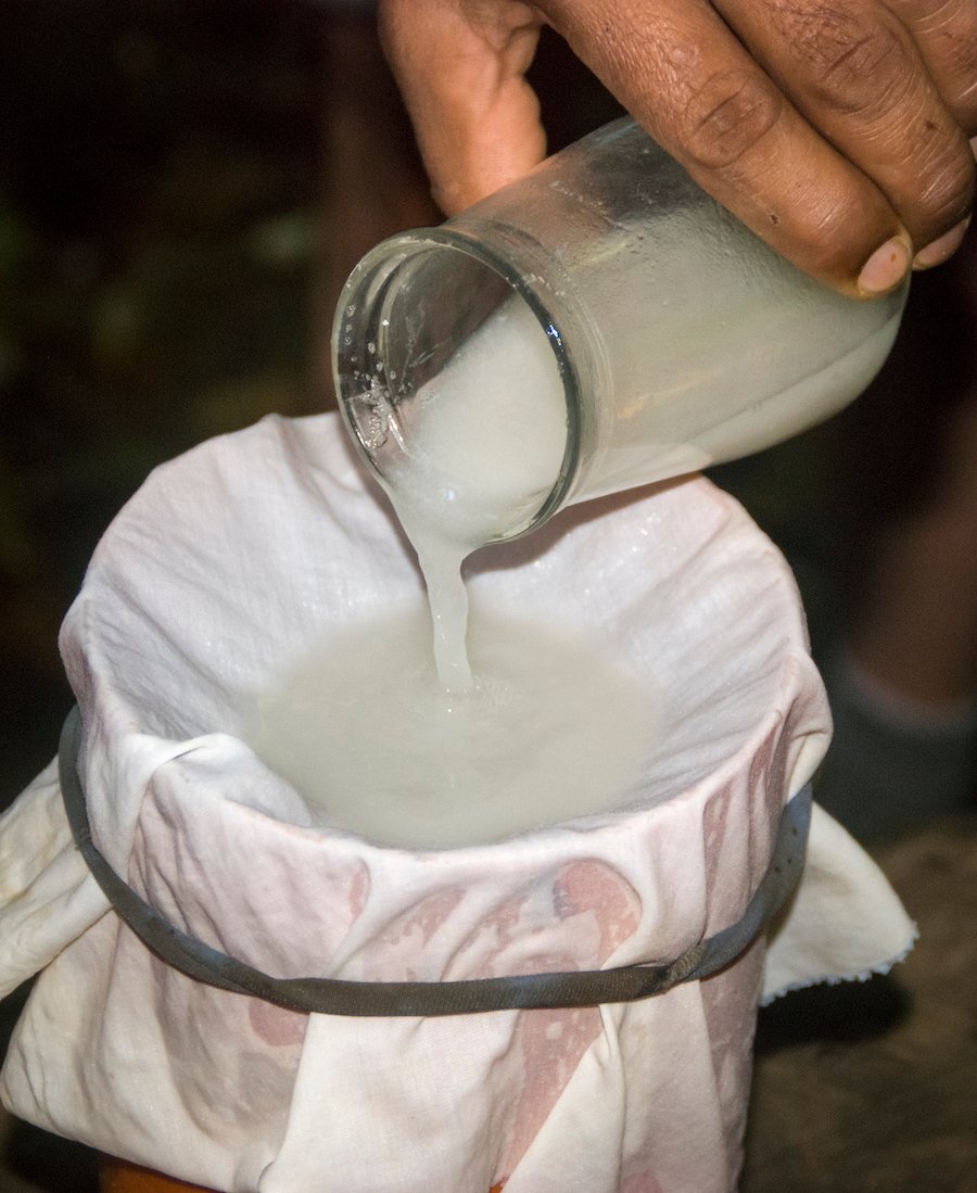 Closeup of hand purifying cocaine in violation of 11379.6 HS